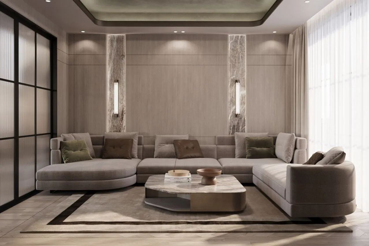 Family lounge with a deep taupe wraparound sectional, olive and brown cushions and marble mosaic light slots