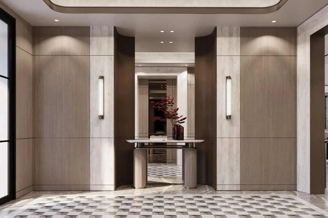 Entrance foyer with curved oak piers, travertine banding, a marble console table and checkerboard stone floor