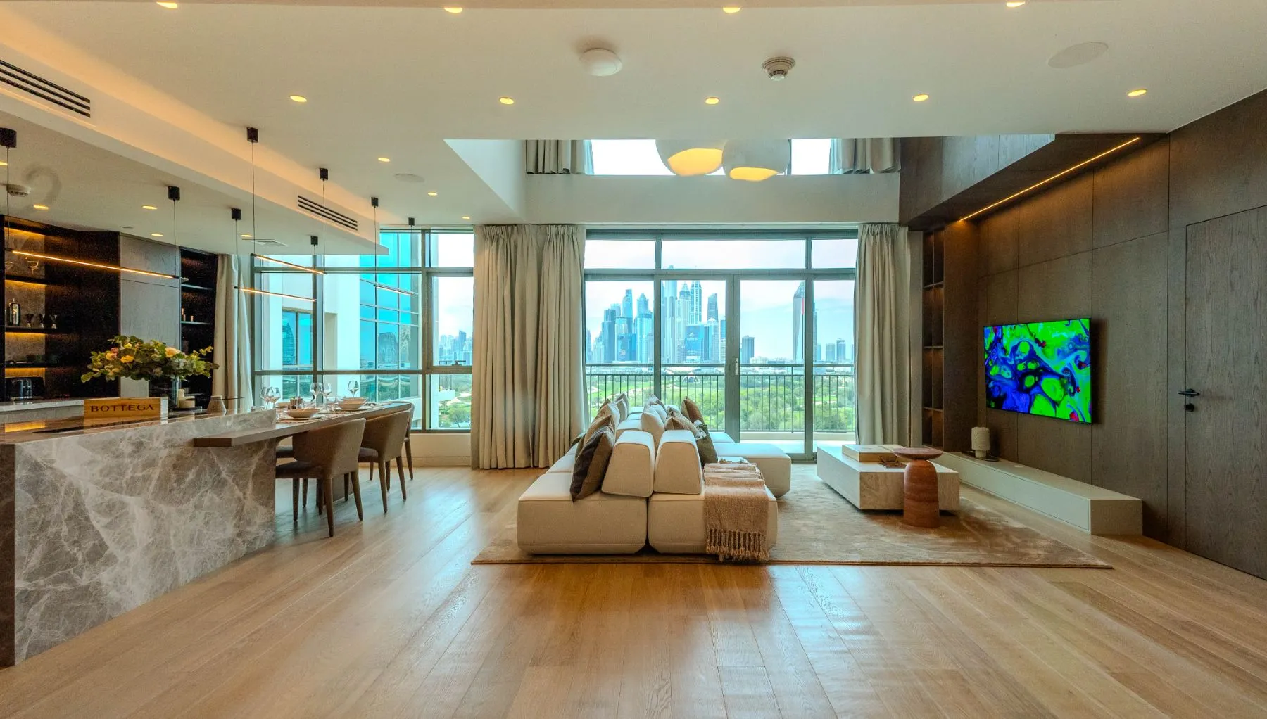 Skyline framed by full-height glazing