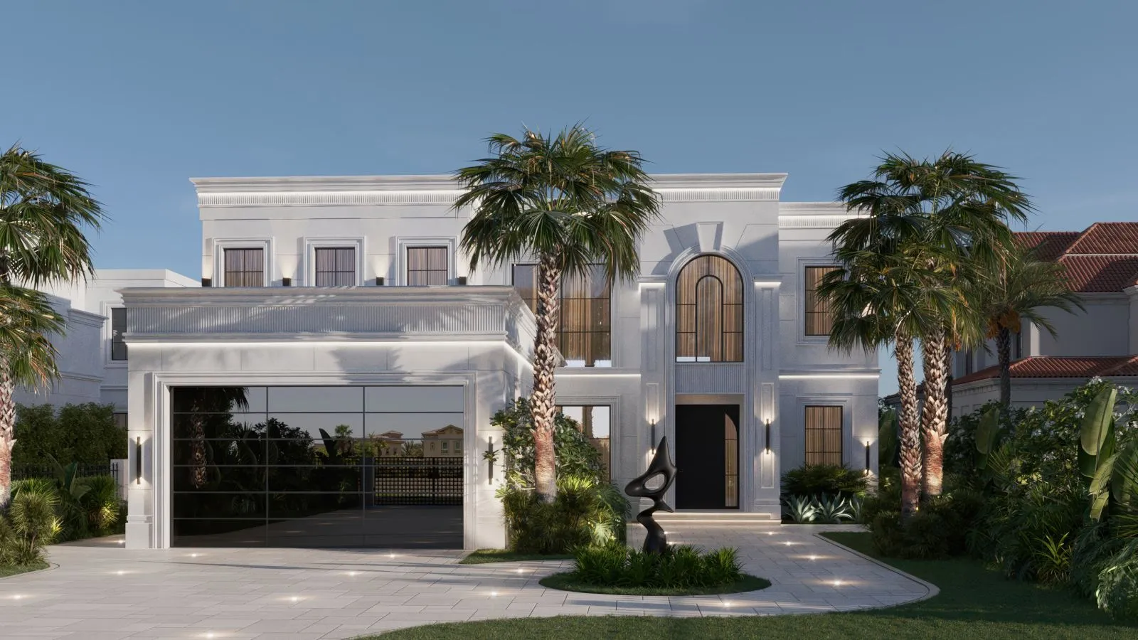 Villa Velora at dusk in Jumeirah Islands Cluster 25, a white stone facade with a tall arched window, lit palms and a glazed showroom garage