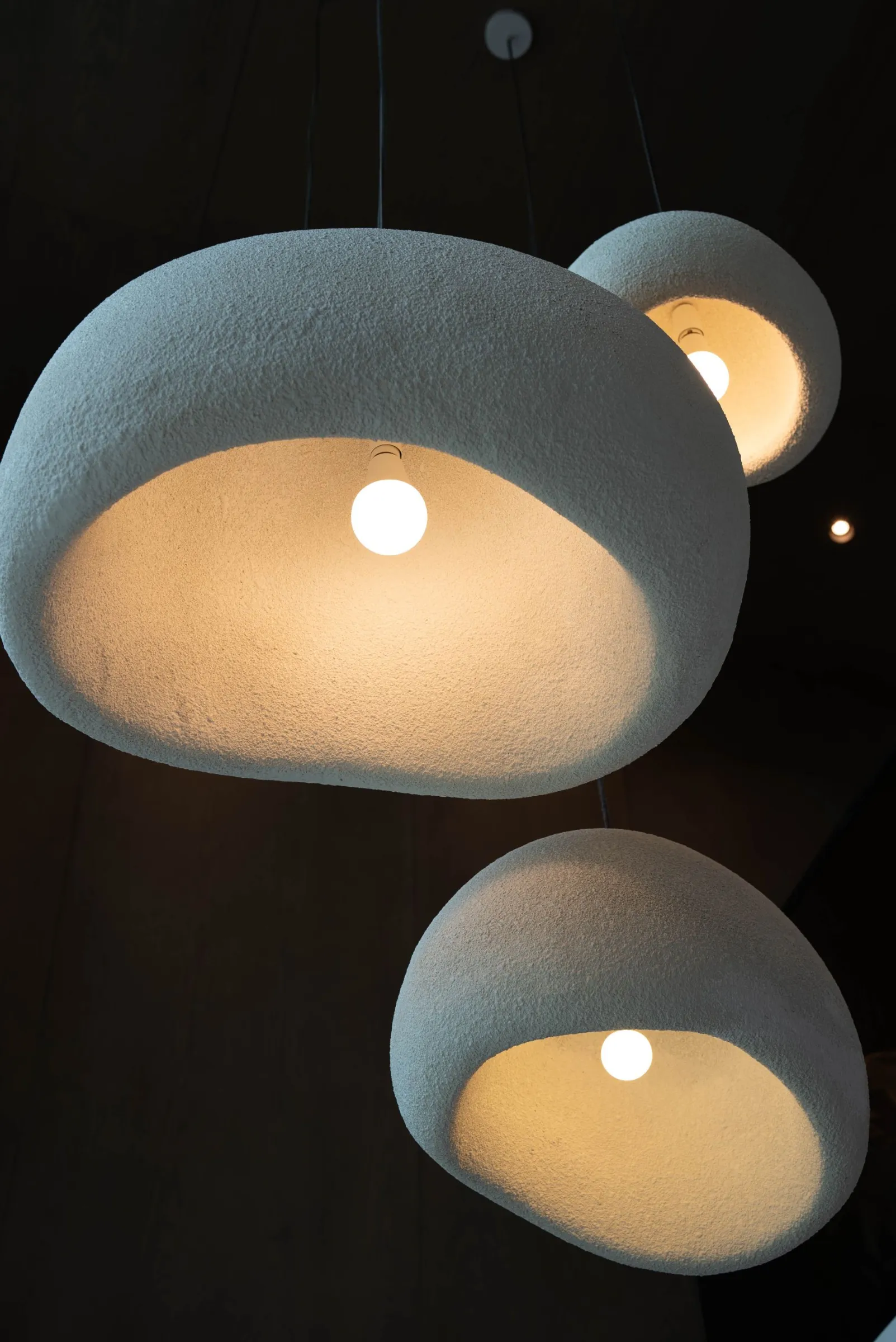 Sculptural textured pendant cluster