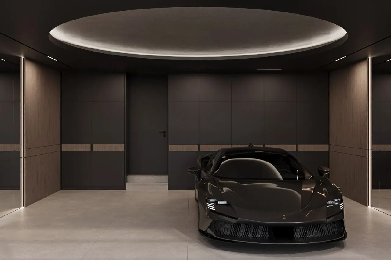 Showroom garage in dark oak and graphite panelling with a backlit oval ceiling disc and linear light slots