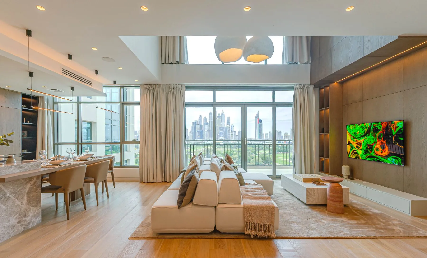 Penthouse Panorama double-height living room over the Dubai skyline