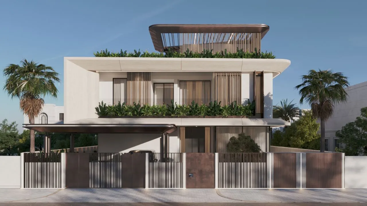 Street elevation of La Mer Villa behind a bronze and fluted-timber boundary wall with lit vertical reveals and a pivoting entry gate