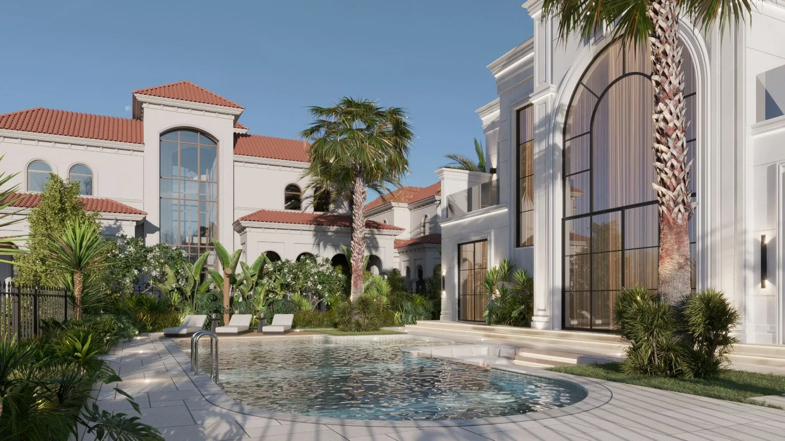 Pool and planted garden at Villa Velora looking back along the terrace with palms and tropical planting