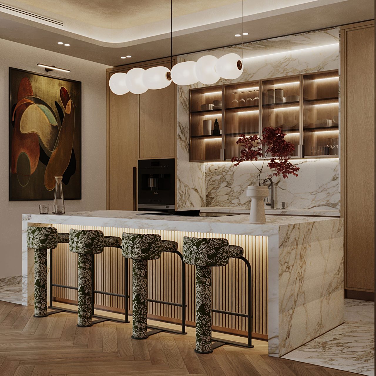 Villa kitchen with a calacatta marble island, printed green bar stools and backlit reeded glass cabinets