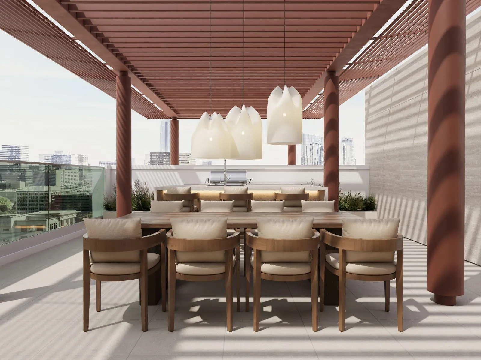 Roof terrace dining under a terracotta batten pergola with alabaster pendants, an outdoor kitchen island and the Dubai skyline beyond glass balustrades