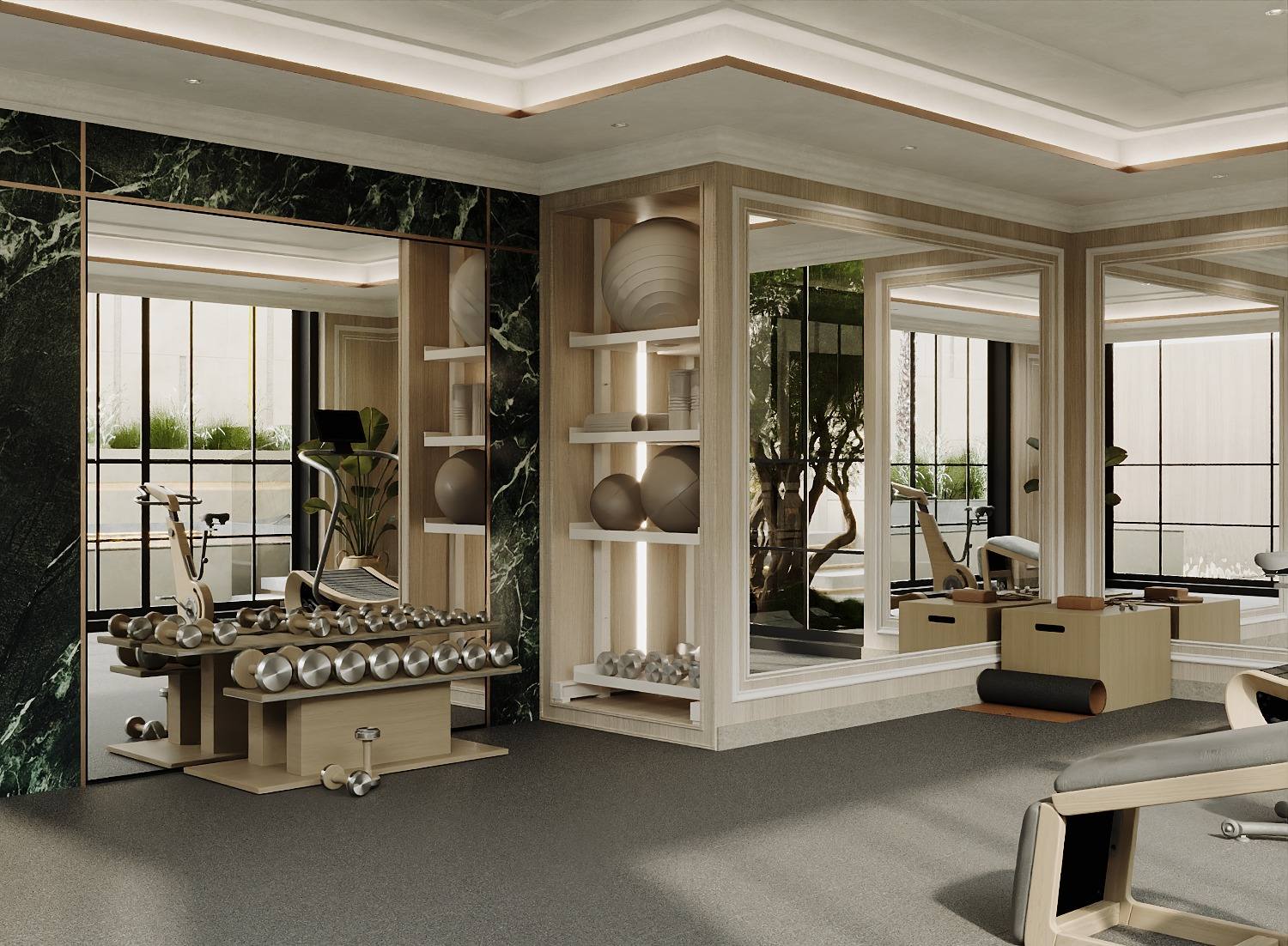 Home gym with mirrored walls, green marble panel and oak equipment joinery