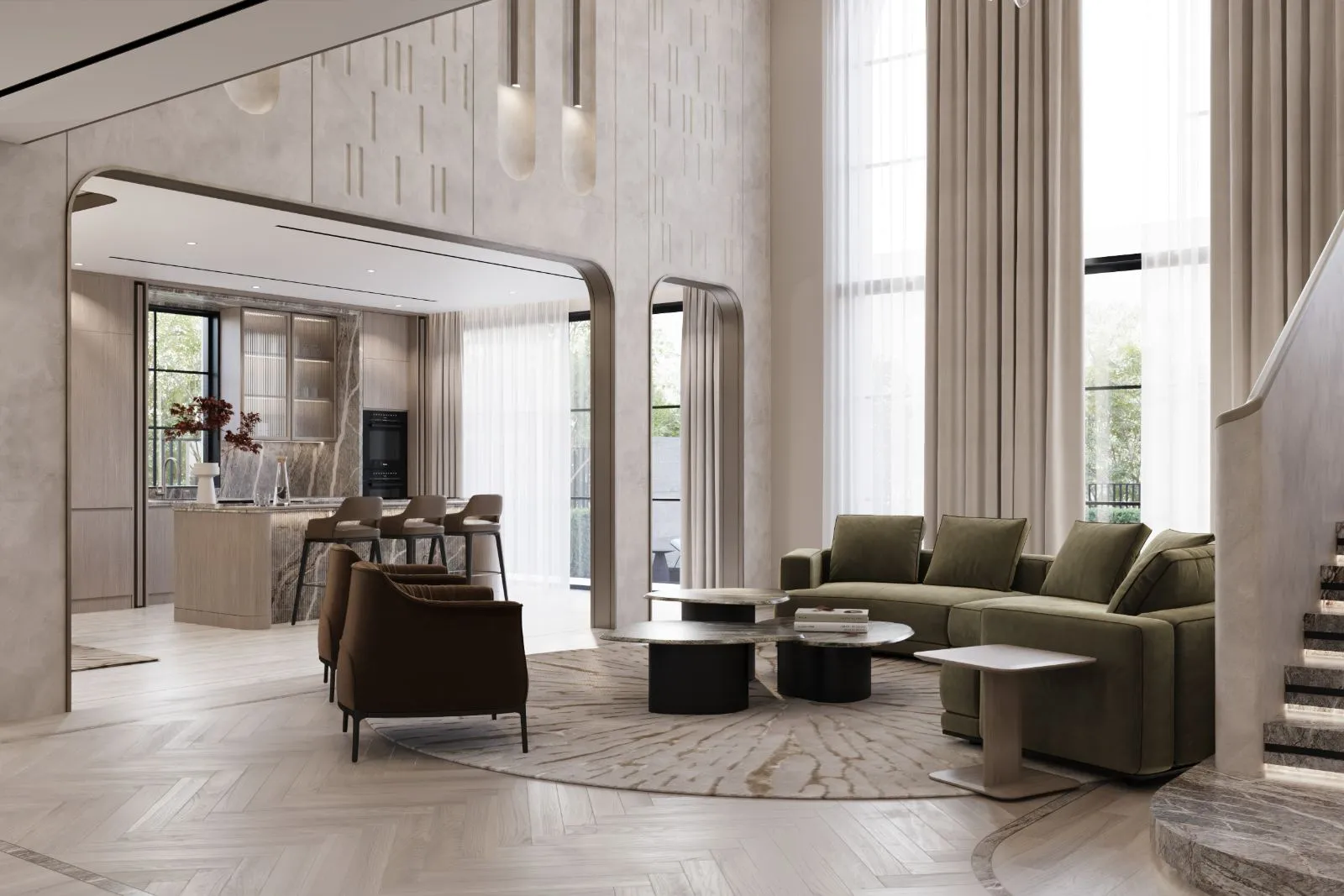 Double-height living hall at Villa Velora with a folded travertine staircase, curved olive velvet sectional and gold leaf pendant installation
