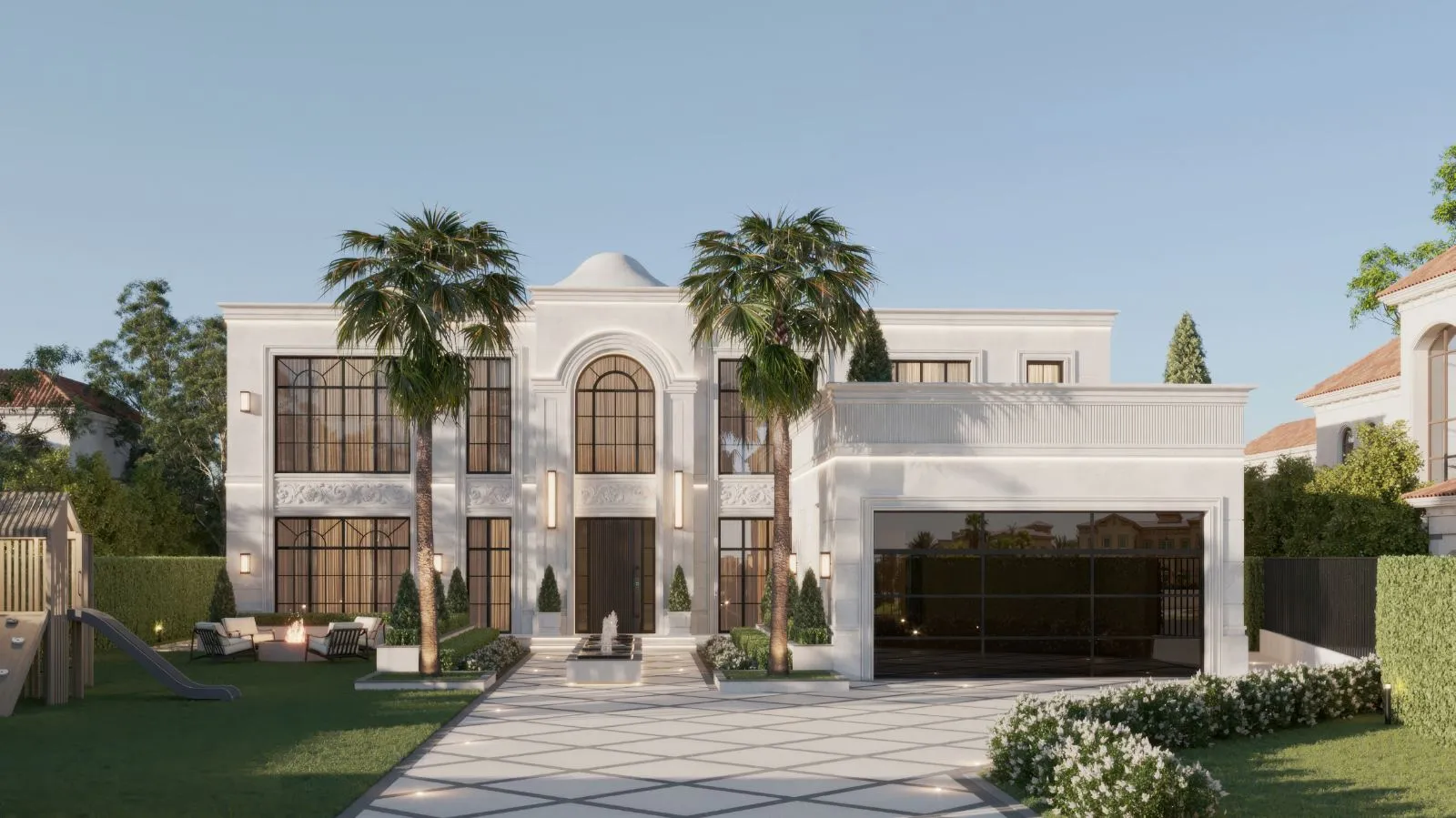 Villa Capri at dusk in Jumeirah Islands Cluster 28, a white stone facade with an arched entrance portal, carved frieze, palms and a diamond-set stone driveway