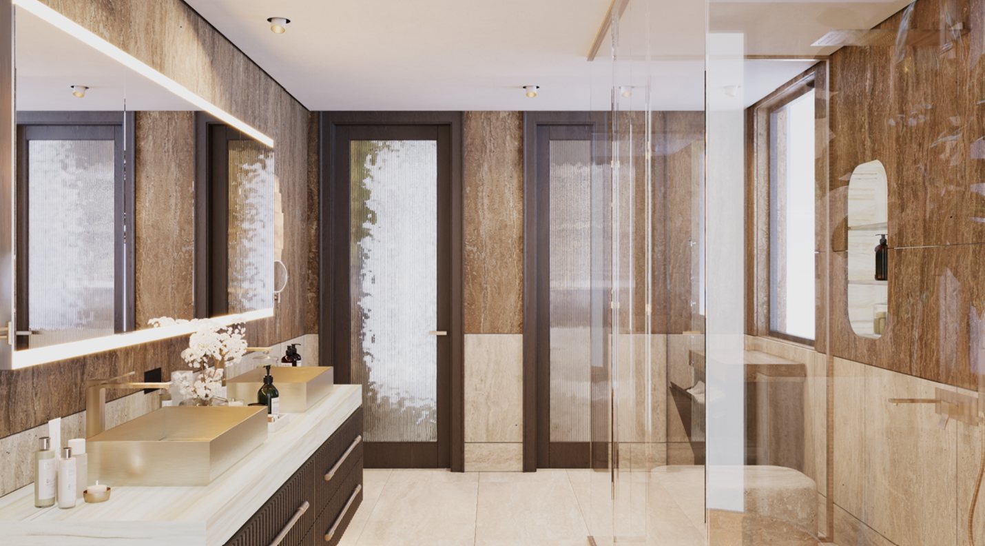Travertine bathroom with brass basins and reeded-glass doors