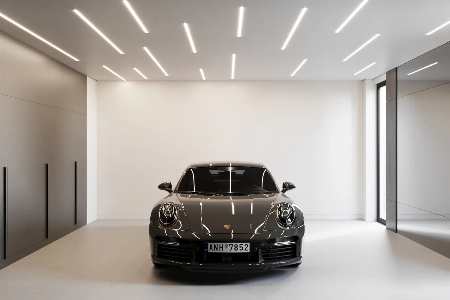 Garage with linear ceiling lights, full-height storage and a sports car
