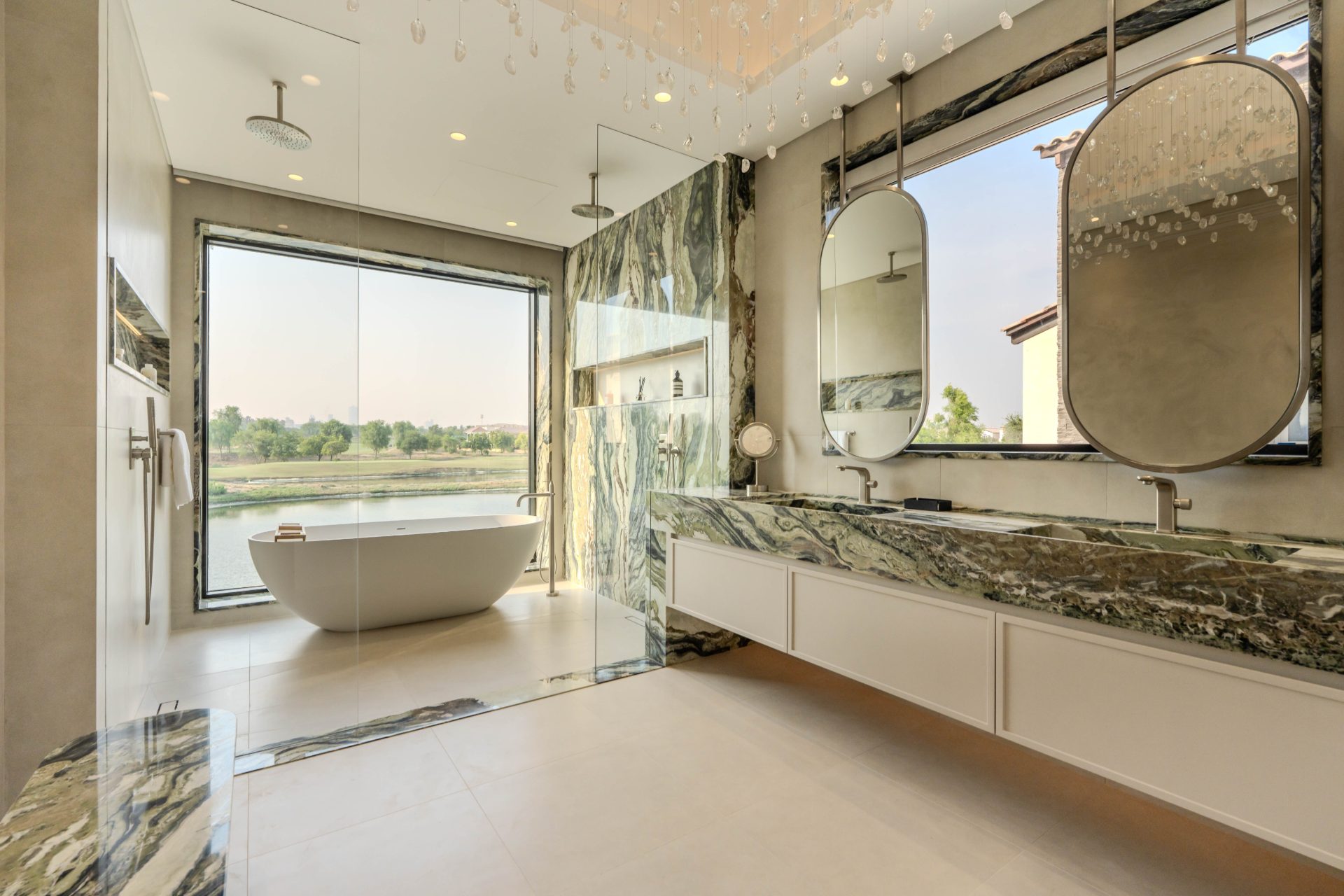 Principal spa bath with lake view