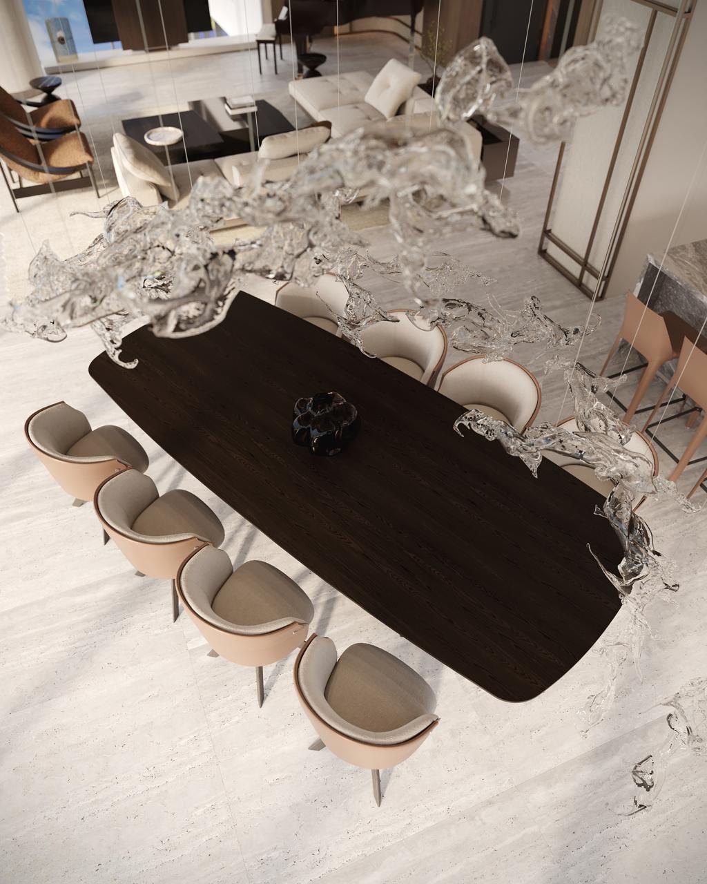 Dining table from above with hand-blown glass installation suspended overhead