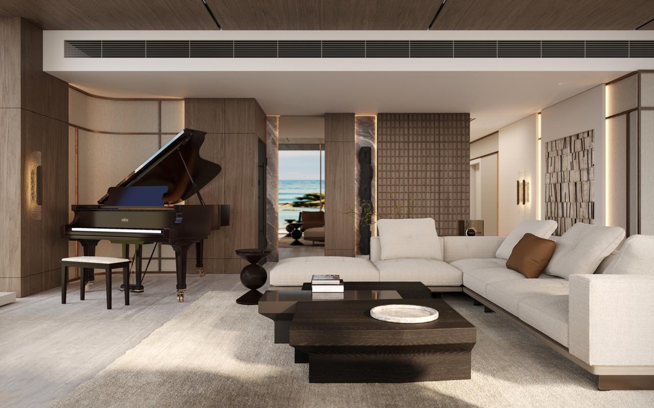 Piano lounge with oak and linen panelling, dark marble reveals and a framed sea view beyond