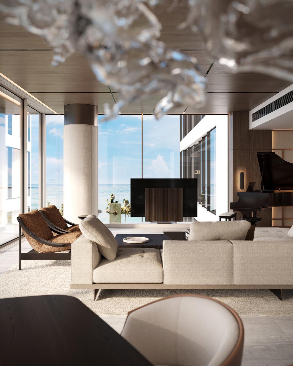 View from the dining table through the living room to the Arabian Gulf, glass installation overhead
