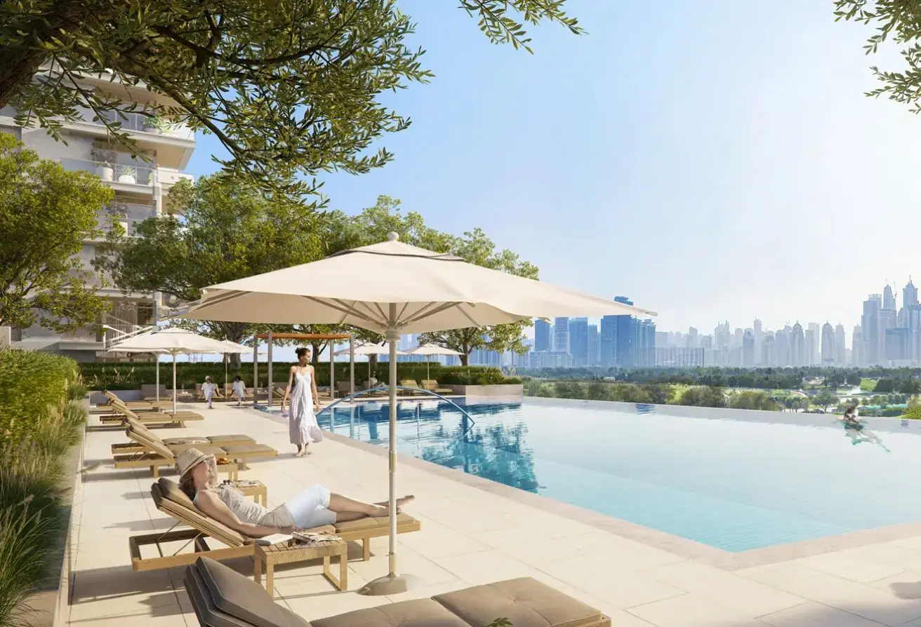 Infinity pool deck with golf course views