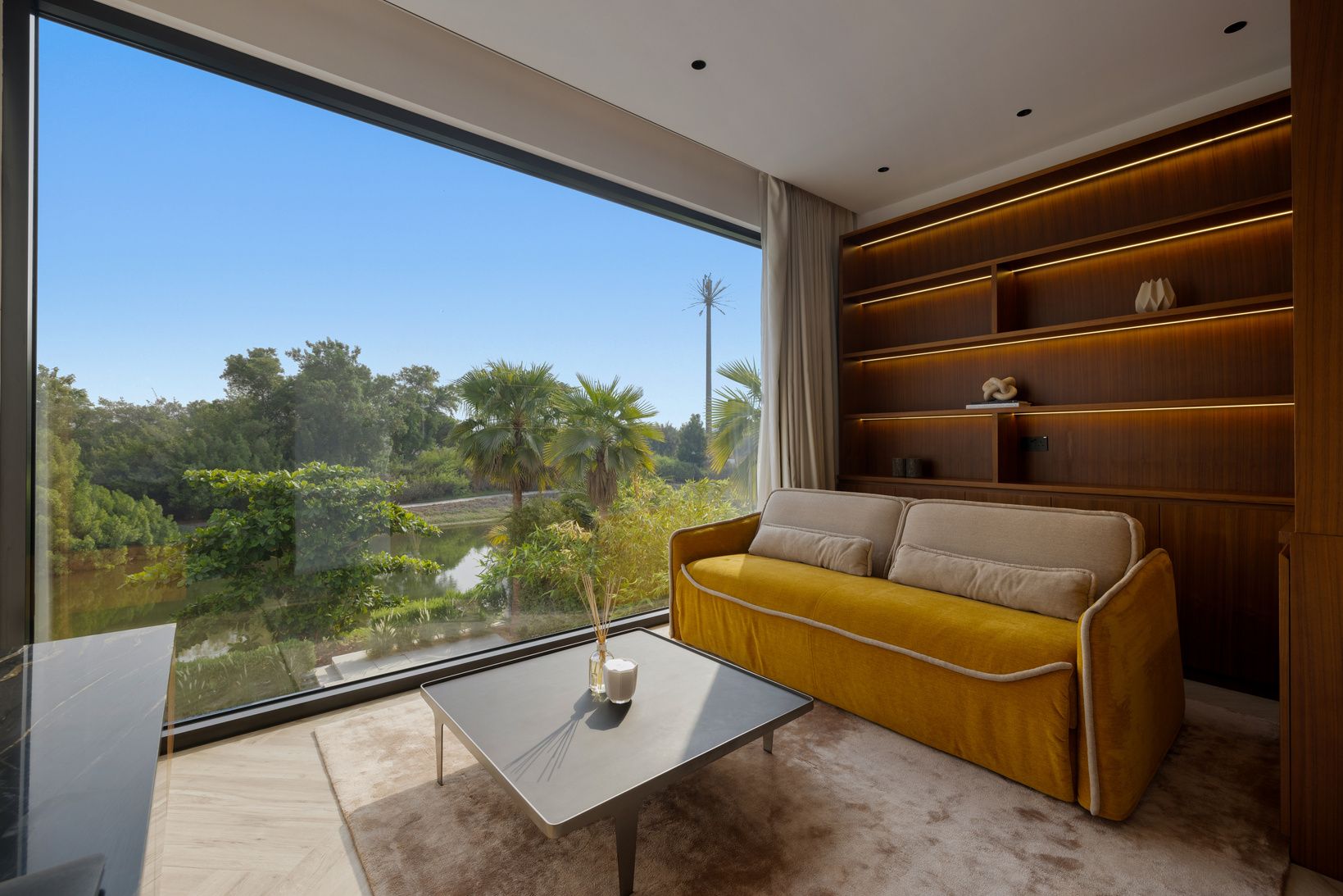Sitting room overlooking the lake and gardens