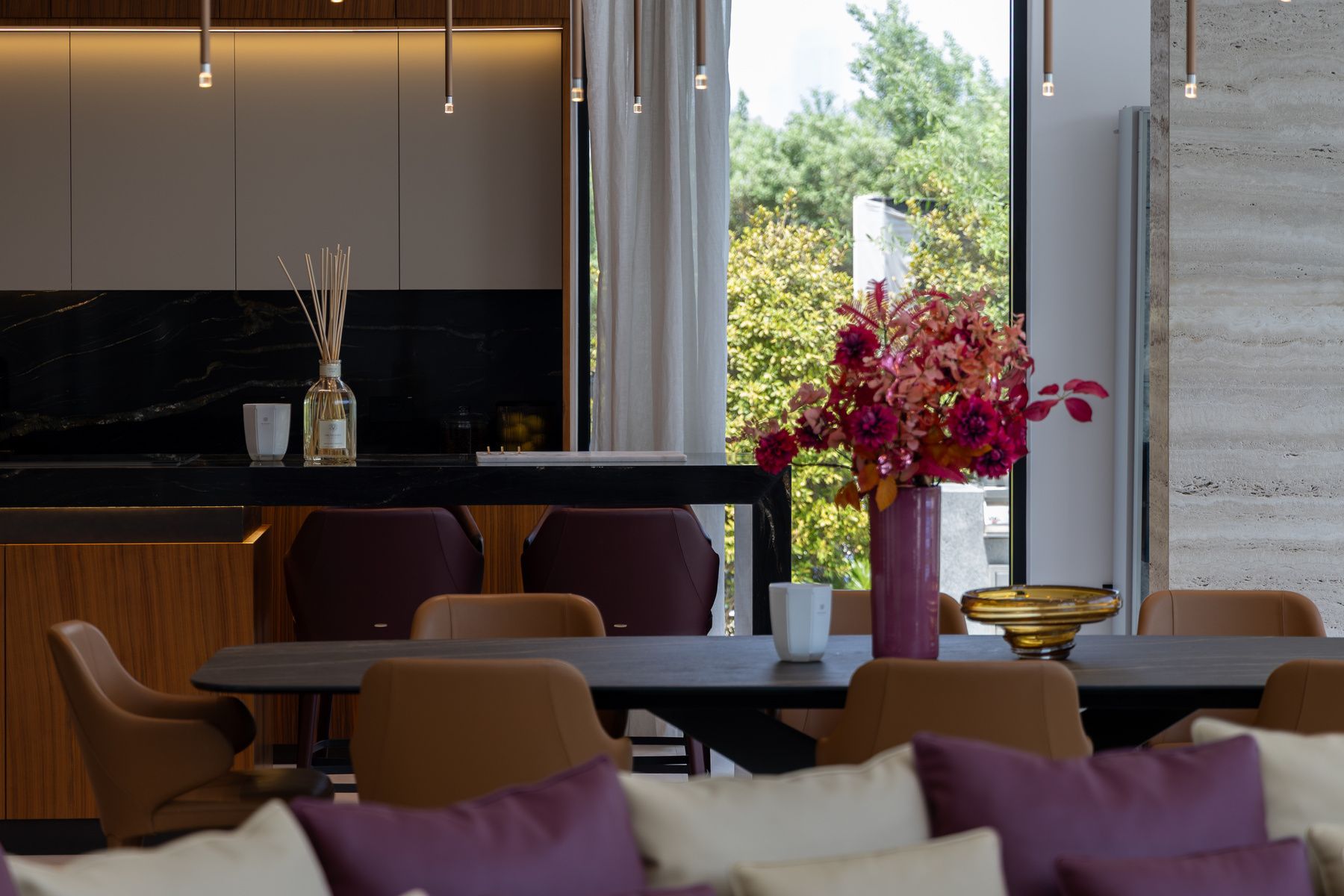 Dining detail with kitchen beyond