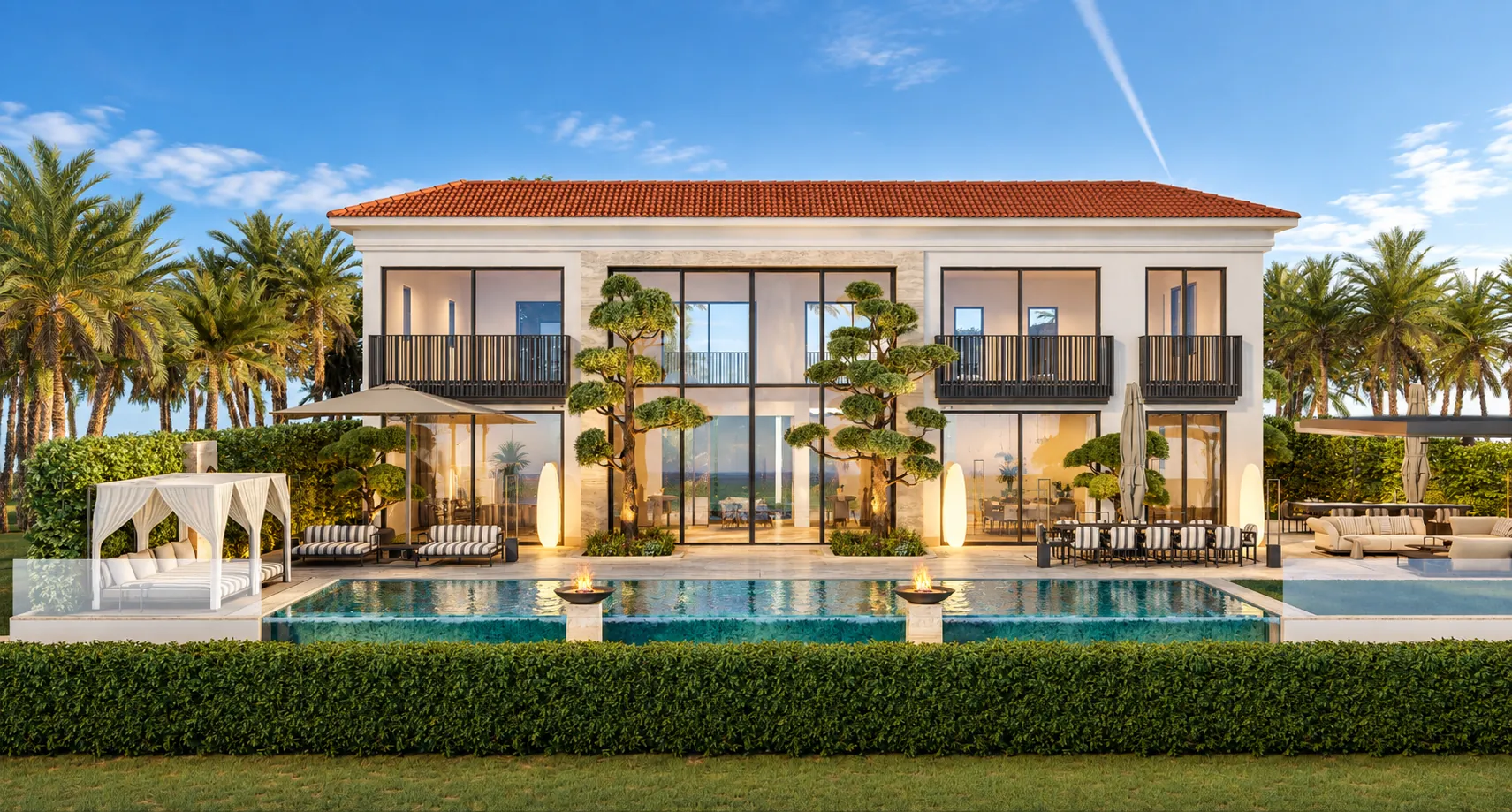 Infinity pool and garden terrace at dusk